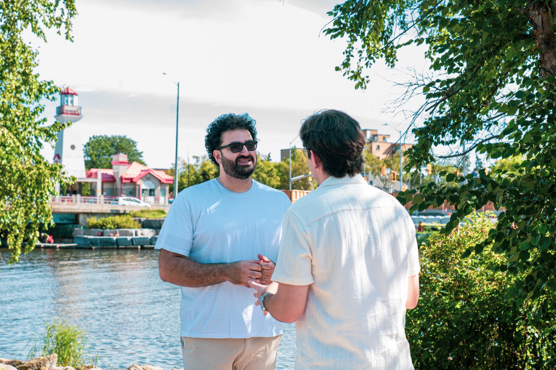 Jad El Ghali listening to a community member in Port Credit
