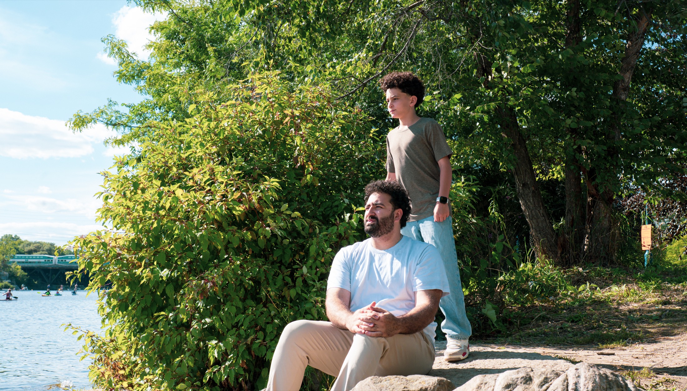 Jad El Ghali spending time with young people beside the Credit River in Mississauga